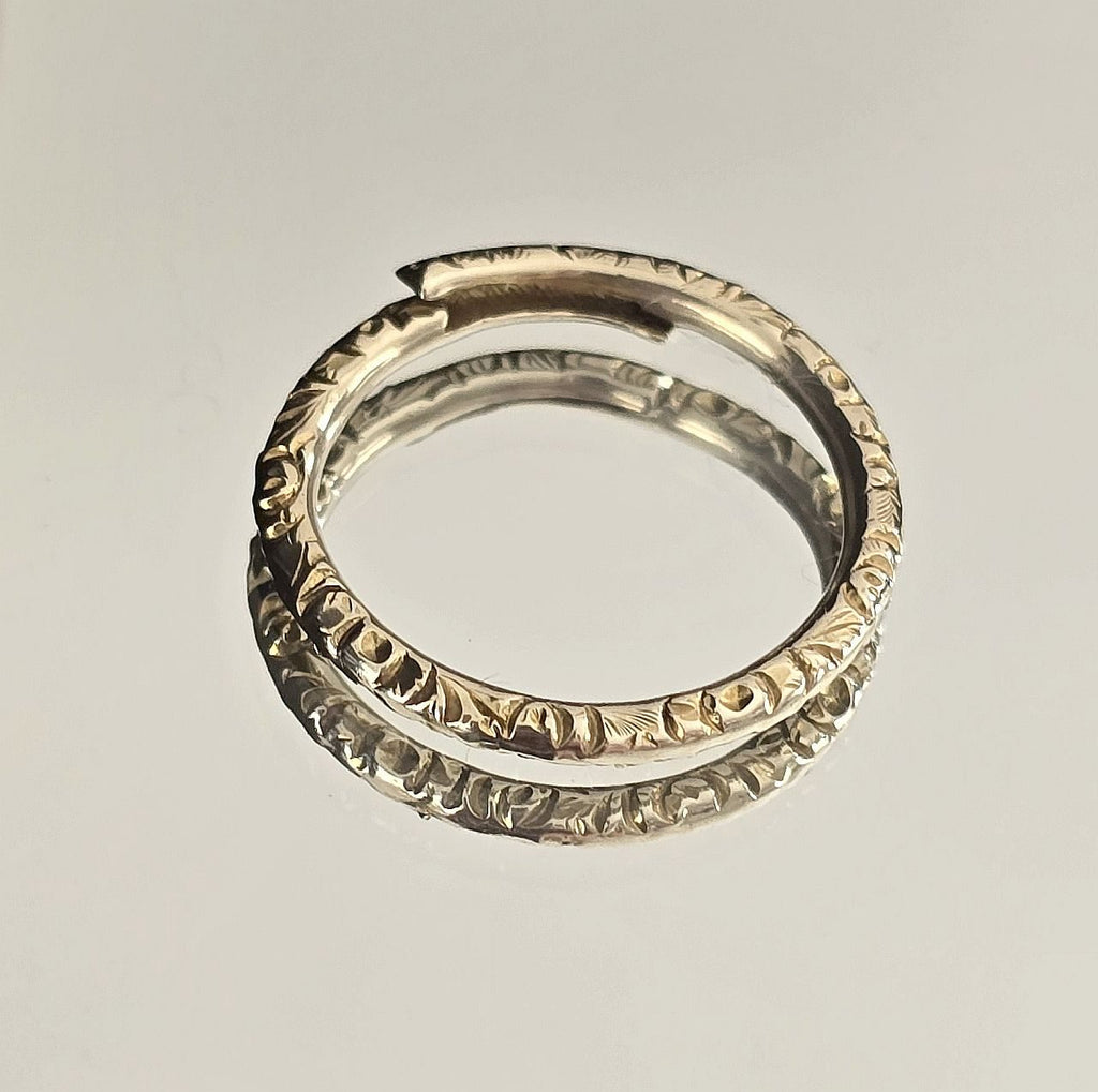 Georgian 12ct gold engraved split ring, side view showing coil and foliate engraving detail