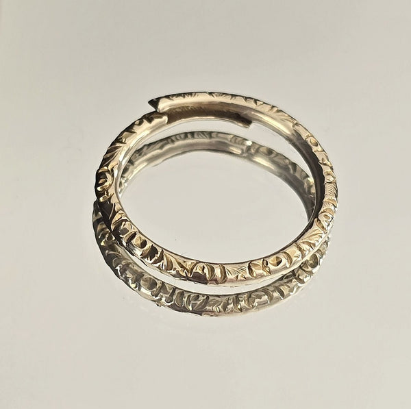 Georgian 12ct gold engraved split ring, side view showing coil and foliate engraving detail